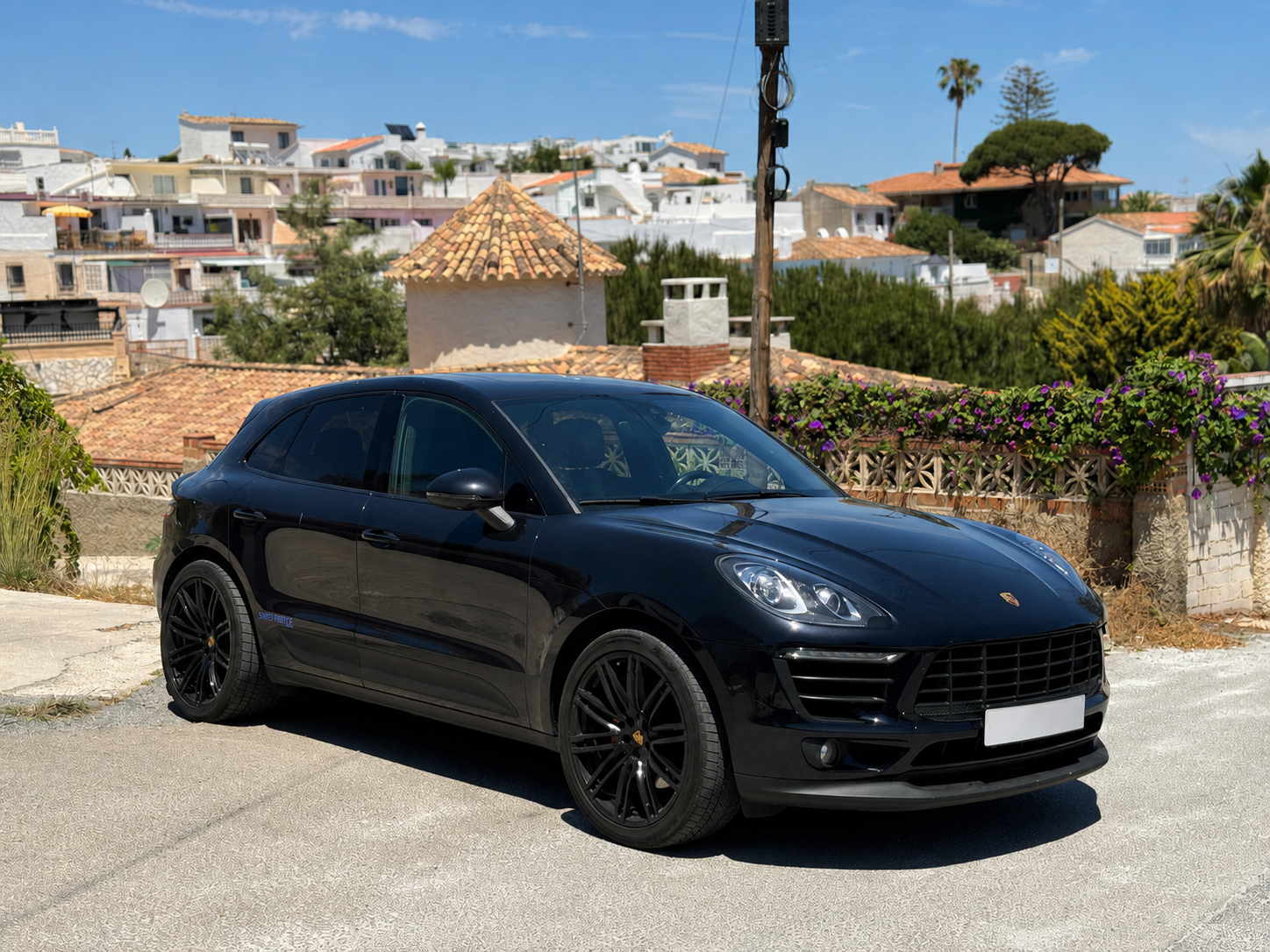 Premium rental vehicle on a Costa del Sol street