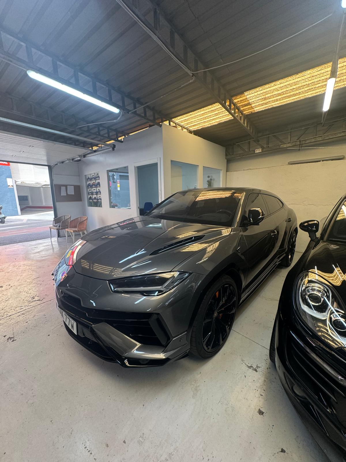 Professional detailing on a black vehicle